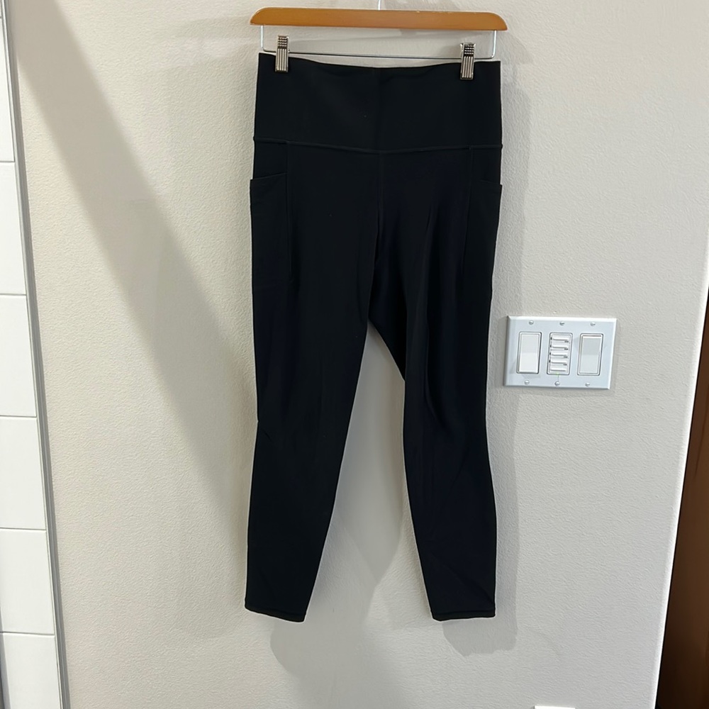 Athleta salutation stash pocket II yoga pants, black medium